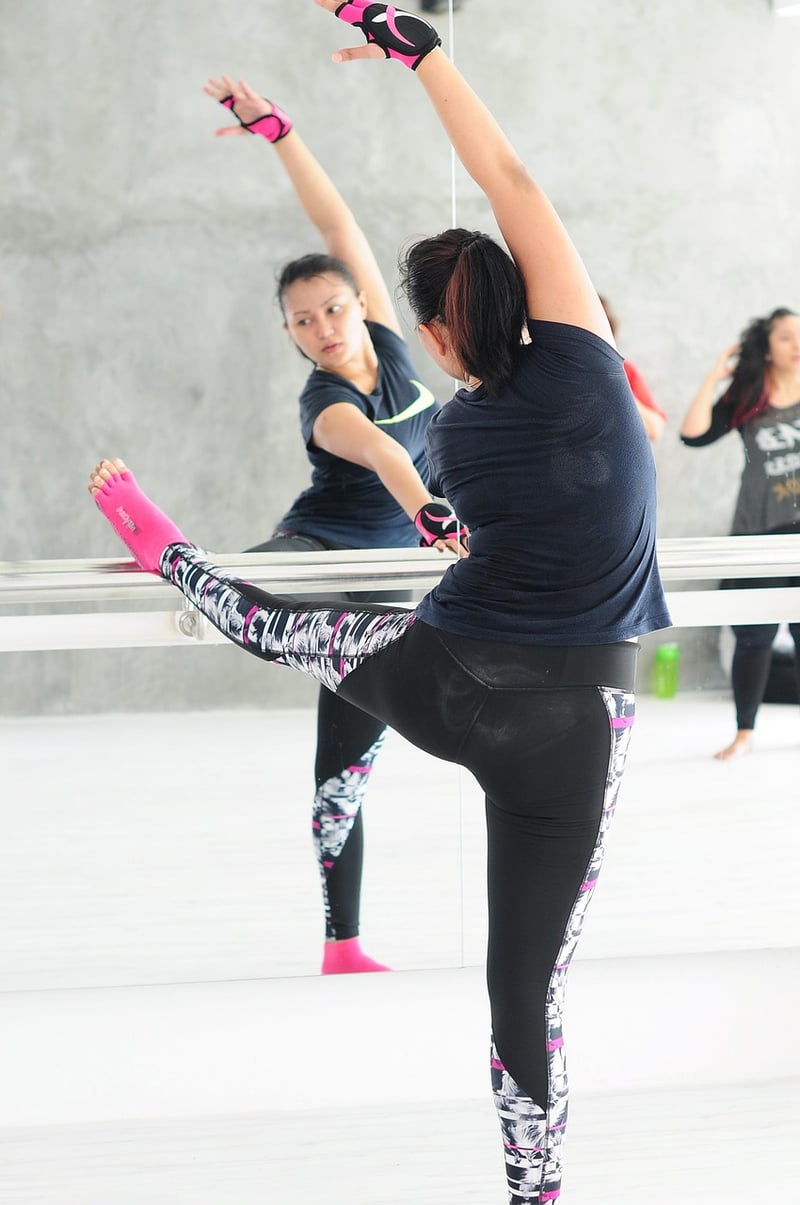 Woman practicing barre workout